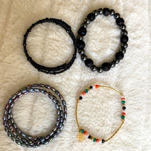 Four beaded bracelets